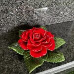 red rose on grave