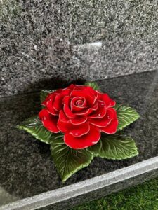 red rose on grave