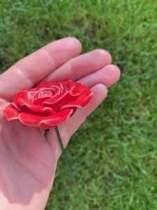 single red ceramic rose